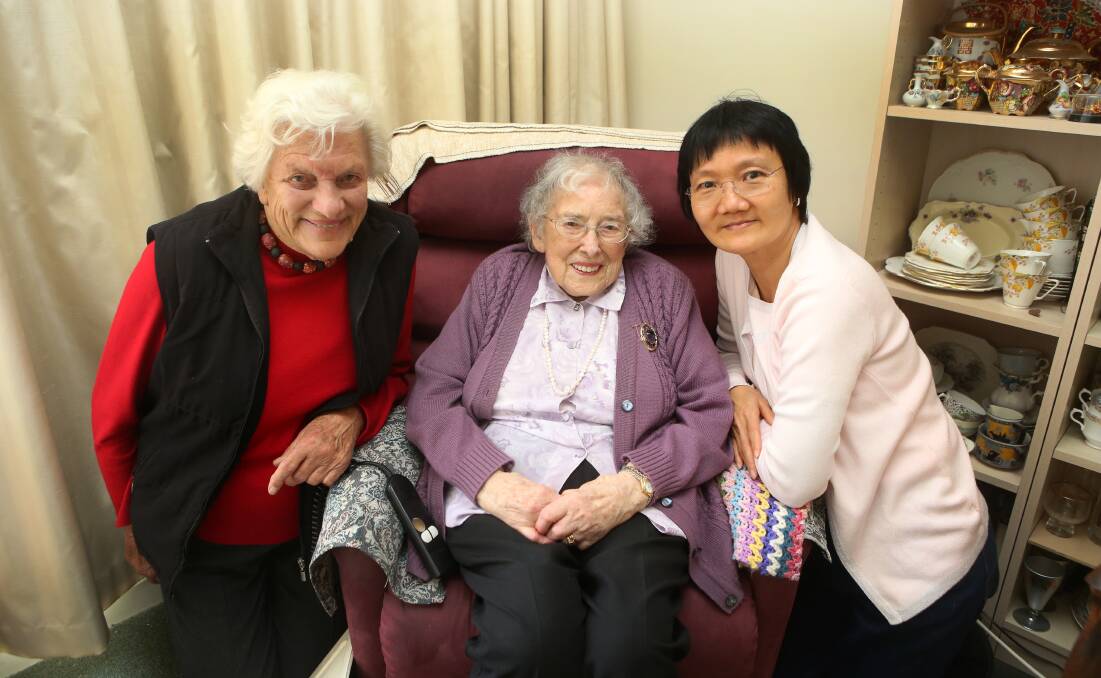 LEGENDS: Education advocates Pat Varley and Nancy Moore with Boey Kit Yew, of Singapore, an international student who studied at WIAE. (above)