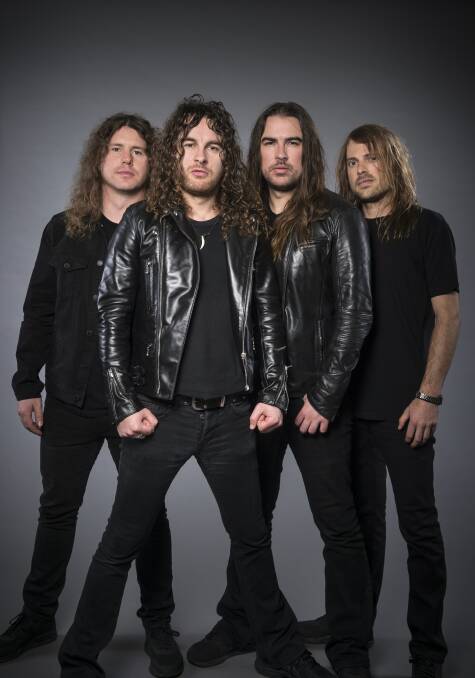 AWARD: Joel O'Keeffe (front) with the other members of Airbourne.