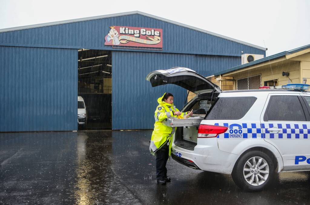 Brazen: Warrnambool crime scene officer Shannon Kavenagh at King Cole Direct Fruit Supply where a door was forced and a safe containing a sum of money was stolen. Picture: Amy Paton