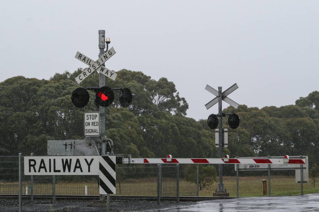 Driver danger: Boom gates, lights and bells at a level crossing in Panmure, similar to the one pictured, have been getting stuck. Residents are concerned about the risk it poses.