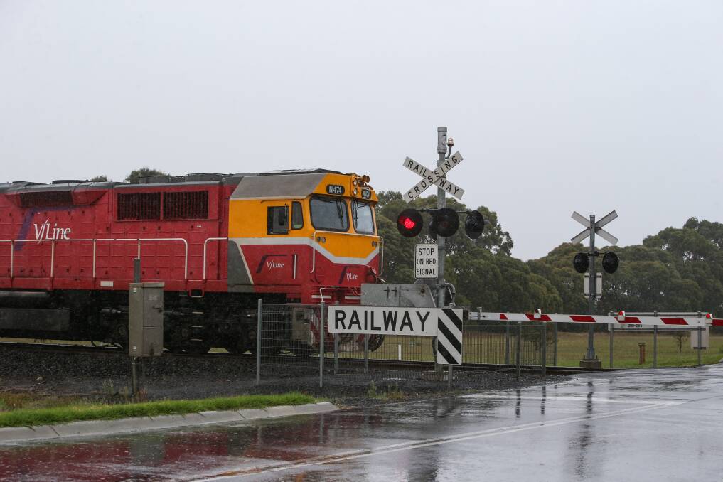 Vline train heading to Warrnambool approaching level crossing at Sherwood Park train station at Deakin University. Picture: Amy Paton