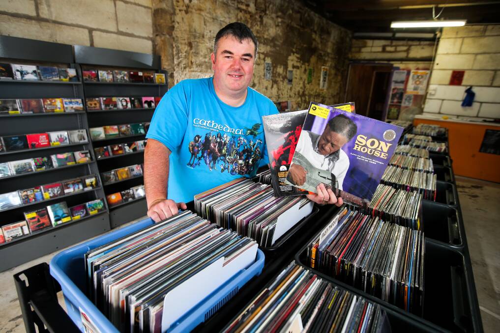 SPIN THE BLACK CIRCLE: Warrnambool's Prehistoric Sounds owner Shane Godfrey is getting ready for Record Store Day. Picture: Rob Gunstone