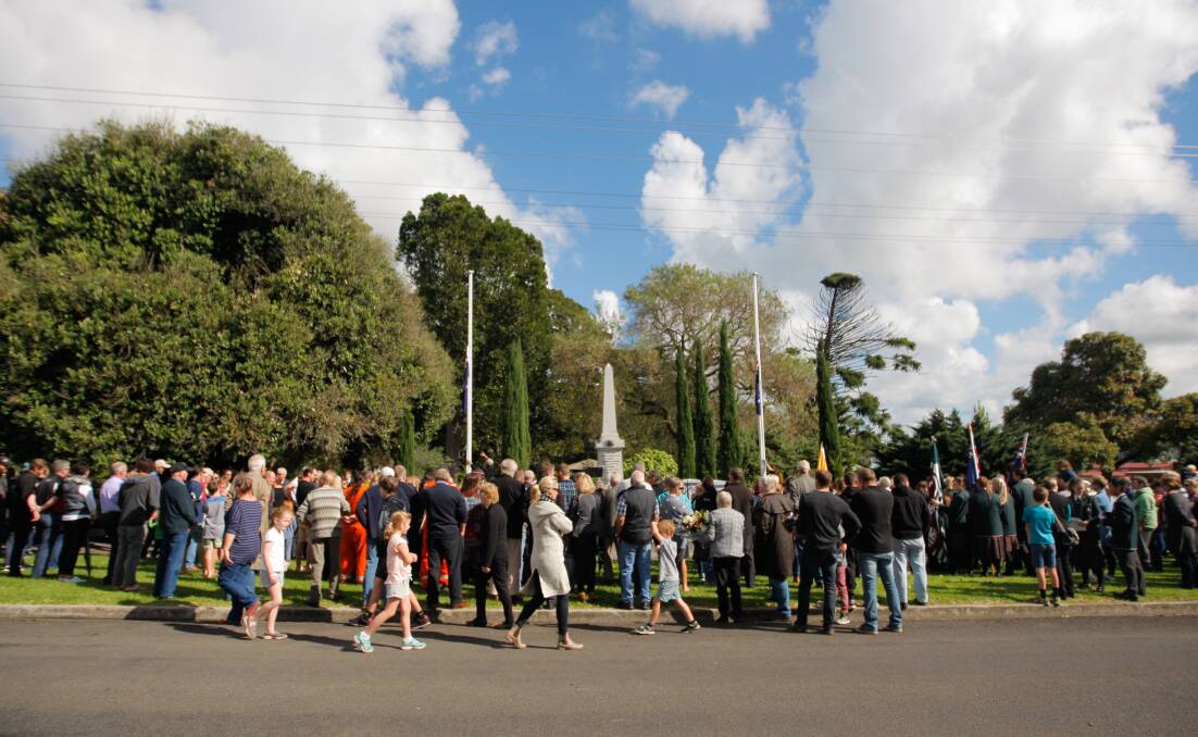 FLYING: A big crowd gathered at the Koroit War Memorial for the 2019 Anzac Day service. Moyne Shire Council will fund new flag poles at the site, which is located in the Koroit Gardens. Picture: Morgan Hancock