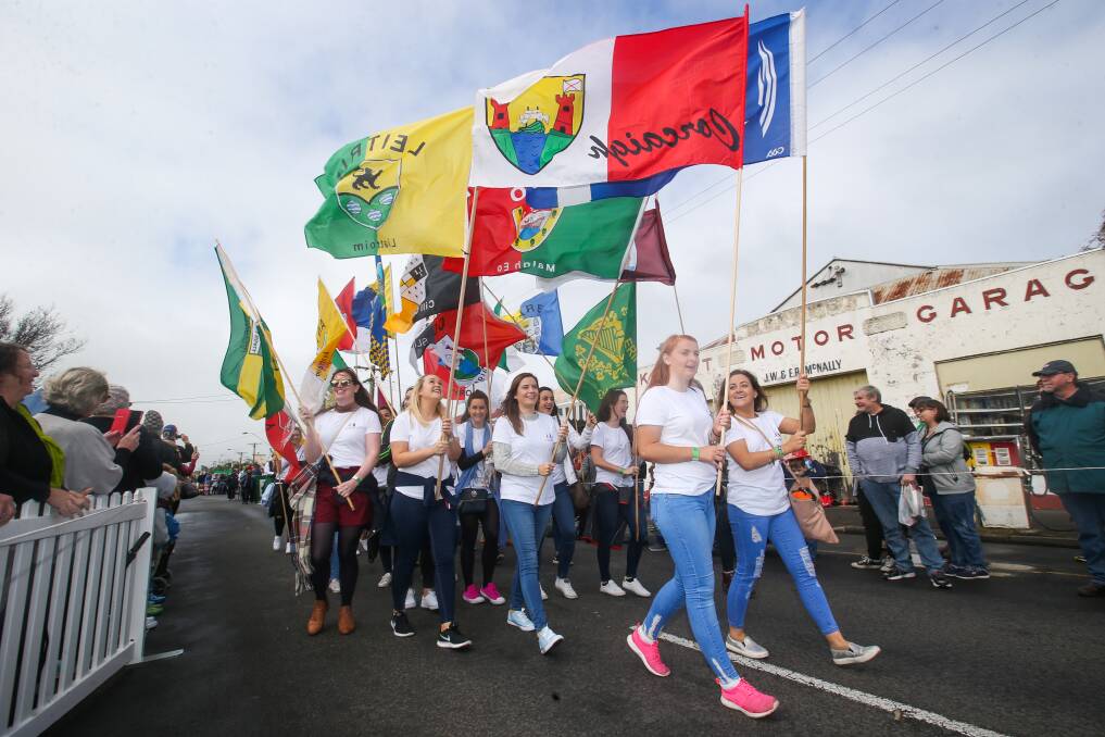 The Garyowen Gaelic footy players displayed flags during the 2017 parade. Picture: Morgan Hancock
