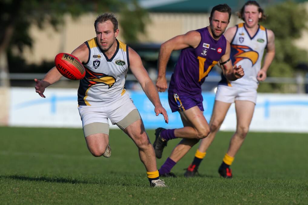 HUNTING THE BALL: North Warrnambool Eagles' Tim Condon chases the loose ball. Picture: Rob Gunstone