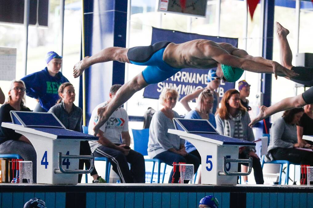 TOP OF THE RANGE: Jason Pritchard of Warrnambool Swimming Club jumps off the blocks during the Warrnambool Swimming Club's long weekend short course meet. Picture: Morgan Hancock