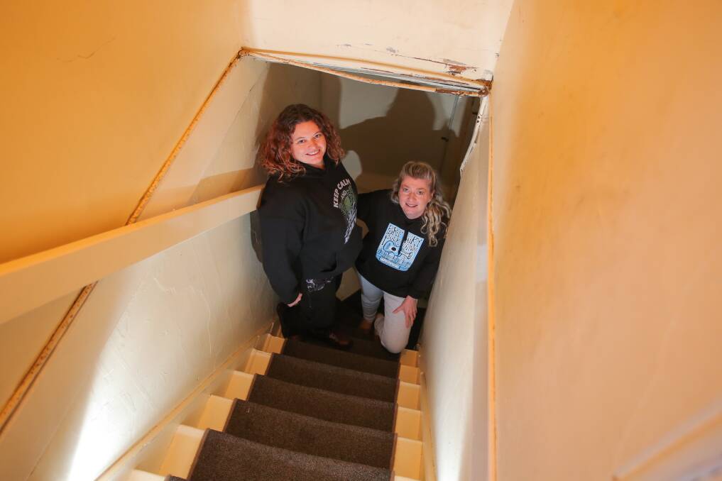 Julie Hoey and Tracie Griffith in the staircase of The Stump.