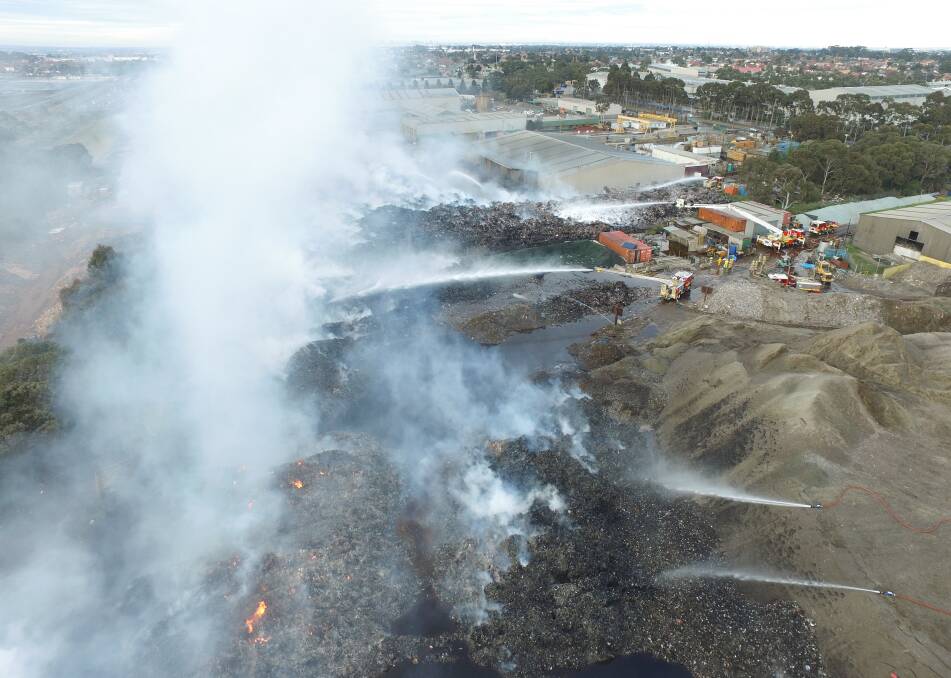 Settled: An aerial view of the fire at the SKM recycling plant in Coolaroo. 