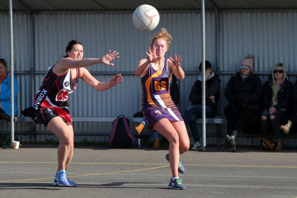 CLEAN BREAK: Koroit goal keeper Jessica O'Connor can't stop the ball reaching Port Fairy goal shooter Emily Forrest at Victoria Park.