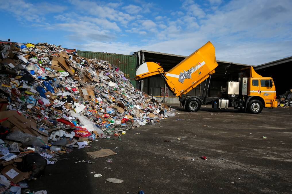  A Wheelie Waste Recycling truck adds to the 150 tonne pile of recycling material, equivalent to one week's worth of collection in Warrnambool. Picture: Rob Gunstone