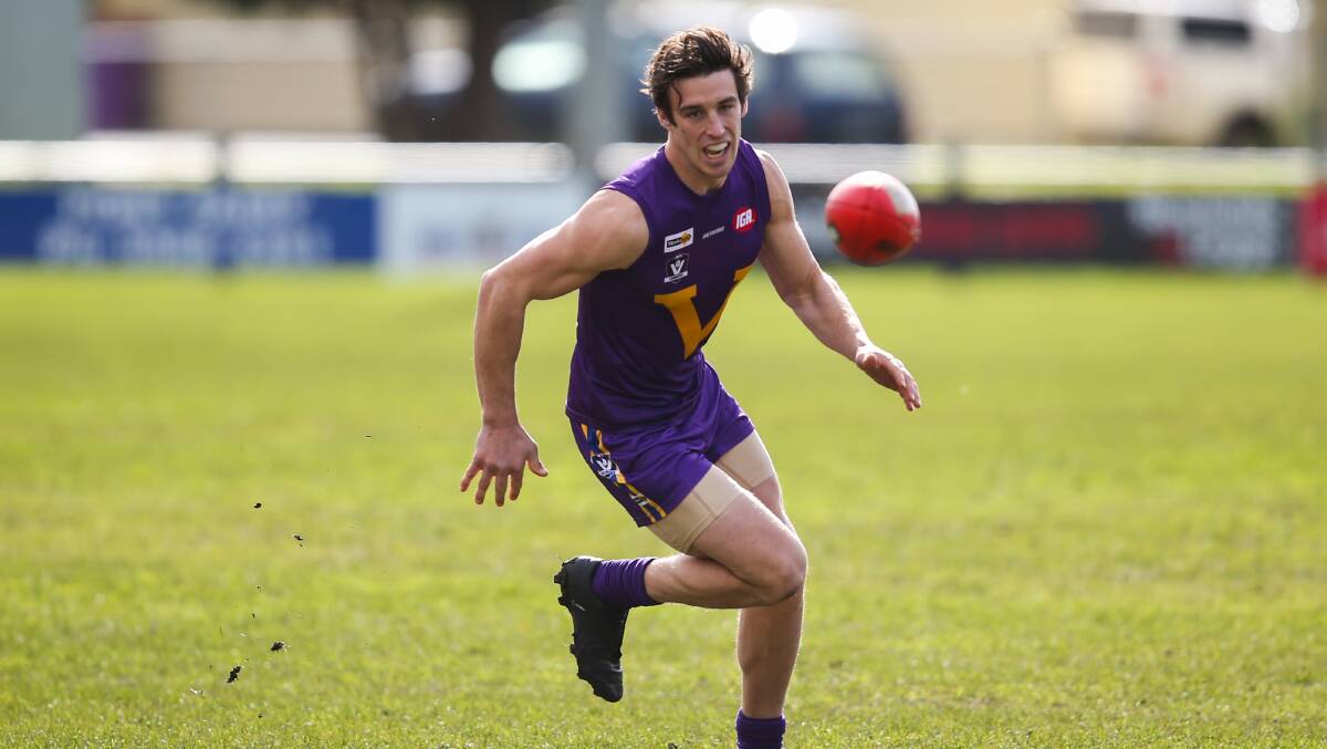 CHASE: Port Fairy's Matthew Sully keeps his eye on the ball. Picture: Morgan Hancock