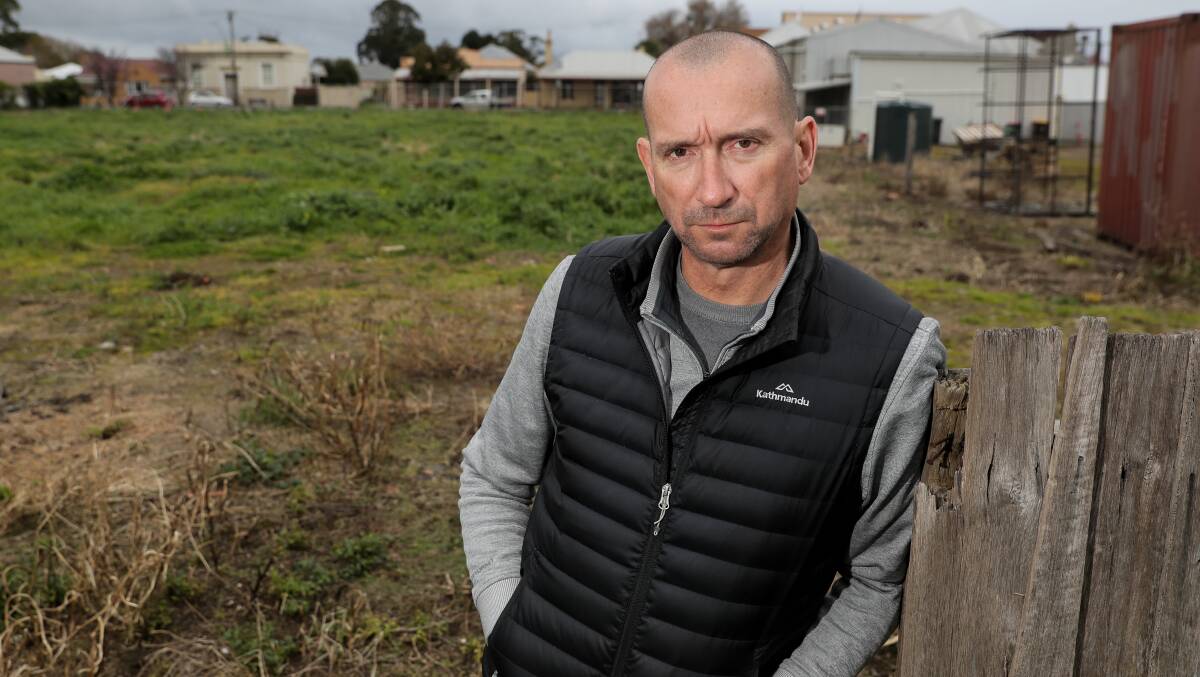 Peter Daly from Daly's Koroit IGA supermarket says the sale of the the former Murray Goulburn Koroit plant to Bega Cheese allows the town to move on from the factory's troubled past. Picture: Rob Gunstone