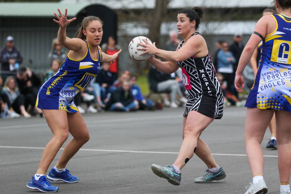 Changing stripes: Leah Sinnott looks to pass the ball forward in her Camperdown days. She will coach the Timboon Demons this year. Picture: Morgan Hancock
