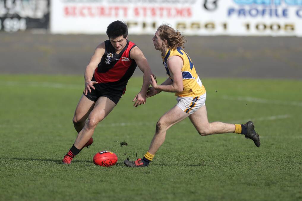 Cobden's Jahd Anderson and North Warrnambool Eagles' Ben Fleming clash over the ball. Picture: Rob Gunstone