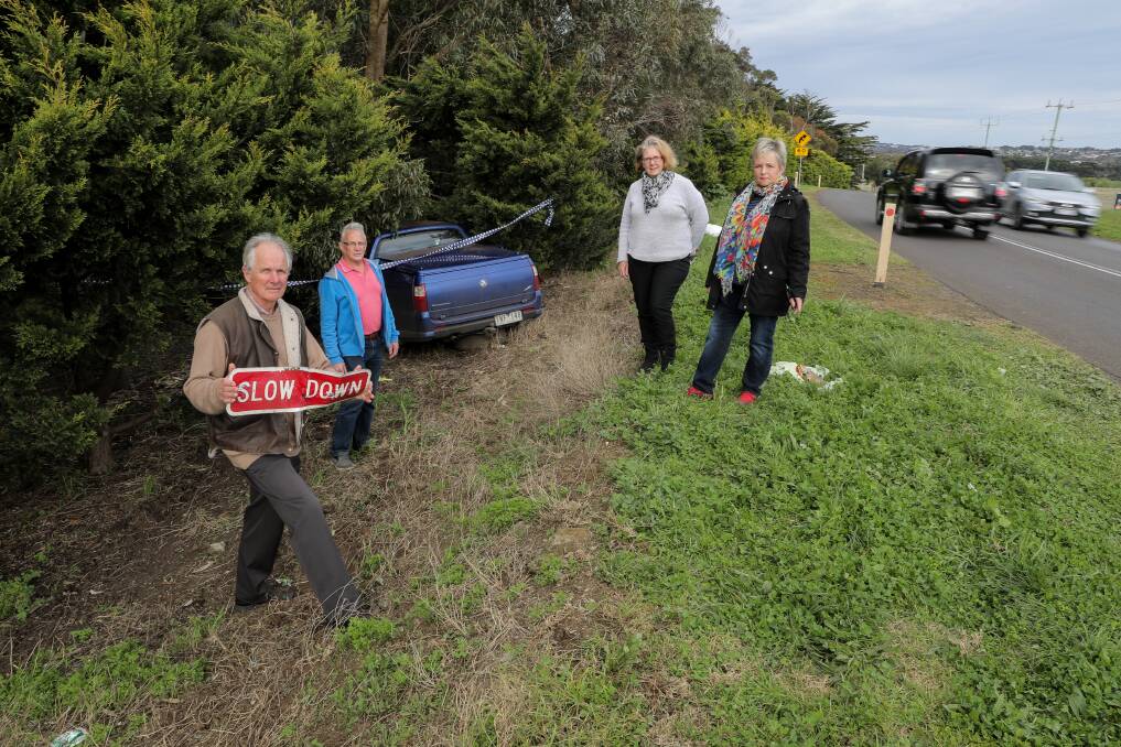 Speed drop: Doug Gardner, Brian McLaren, Sandy Gardner and Lois Morrow where a ute crashed through a slow down sign. Picture: Rob Gunstone