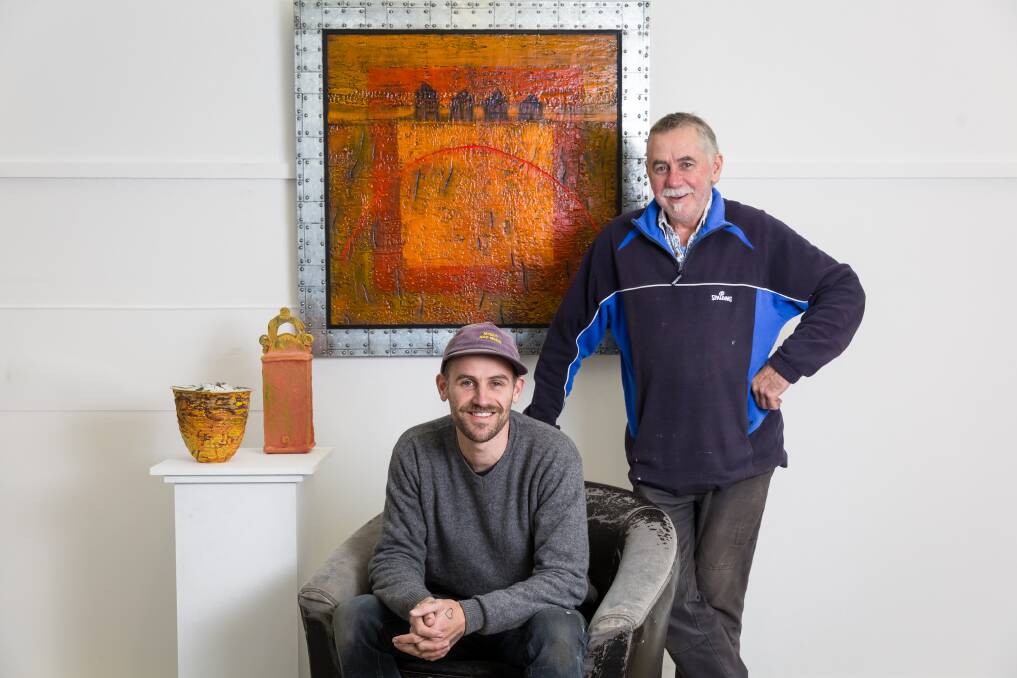 Seeing red: Warrnambool father and son artists Jordan and Chris Small are showcasing their favourite hue in their first joint art exhibition at Outlaw Art Gallery starting Friday. Picture: Christine Ansorge