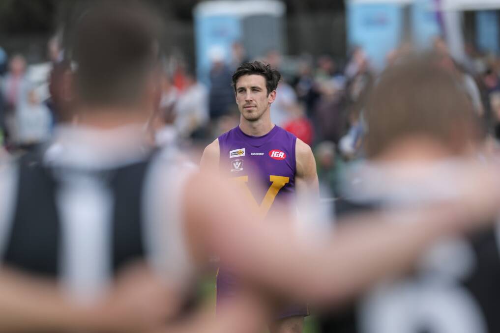 Fierce rivals: Port Fairy's Matt Sully during the singing of the National Anthem in HFNL grand final against Koroit in 2017. Picture: Rob Gunstone