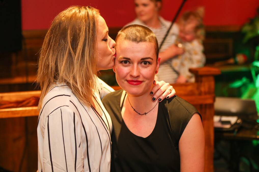 Brave change: Kasey Hallam with friend Danni Neal, who shaved her hair to raise funds for cystic fibrosis and multiple sclerosis. Picture: Morgan Hancock