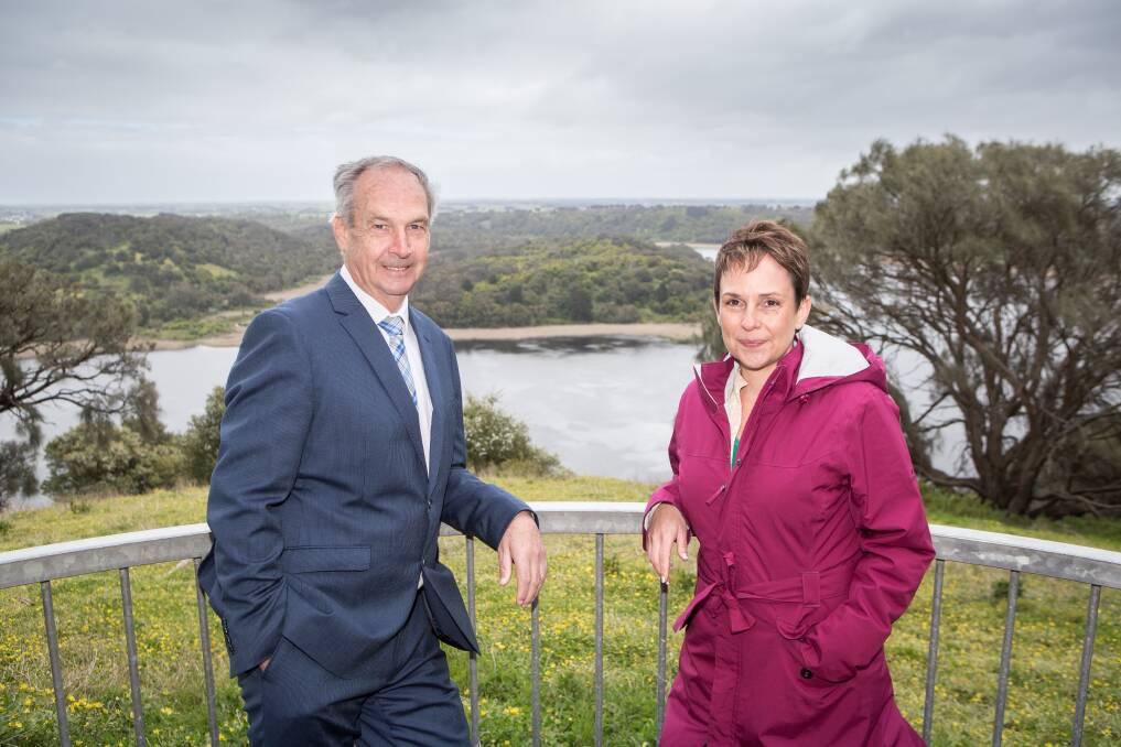 HILLS ARE ALIVE: Upper House member for Western Victoria James Purcell and the Minister for Regional Development Jaala Pulford enjoying the views over Tower Hill. Picture: Christine Ansorge