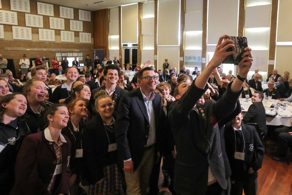 Happy snap: South-west school kids take a selfie with Premier Daniel Andrews at the Great South Coast Regional Assembly. Picture: Rob Gunstone