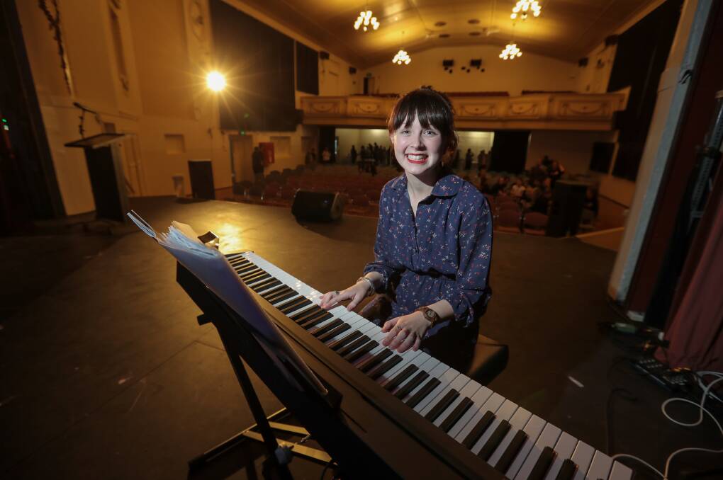 High note: Music category award winner Ciara Fitzpatrick, 16, prepares to play some Missy Higgins for the audience at Friday night's Corangamite Shire youth achiever awards. Pictures: Rob Gunstone