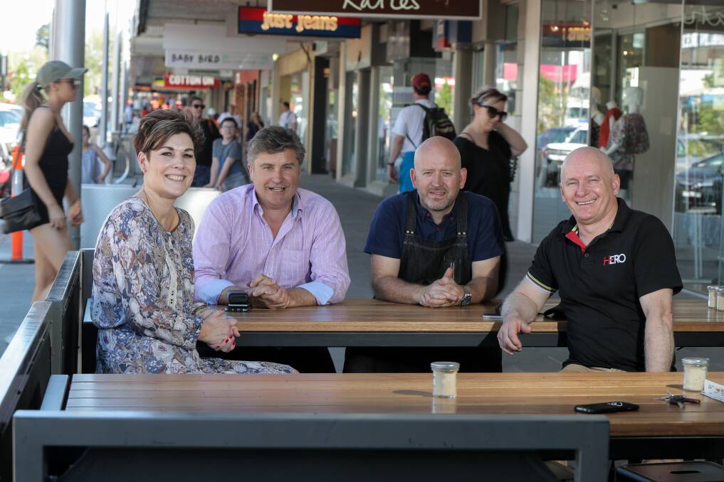 Warrnambool City councillors Sue Cassidy, Tony Herbert, and Peter Hulin talk with Mark Brightwell, Brightbird Espresso (second from right), about the opportunities for new street furniture in Liebig Street. Picture: Rob Gunstone