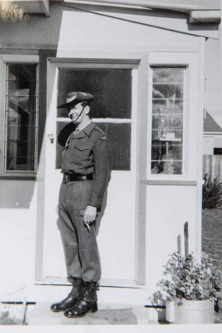 As a young man: John Miles in his uniform at the door of his family home in Bairnsdale before heading to Vietnam in the mid-1960s. 