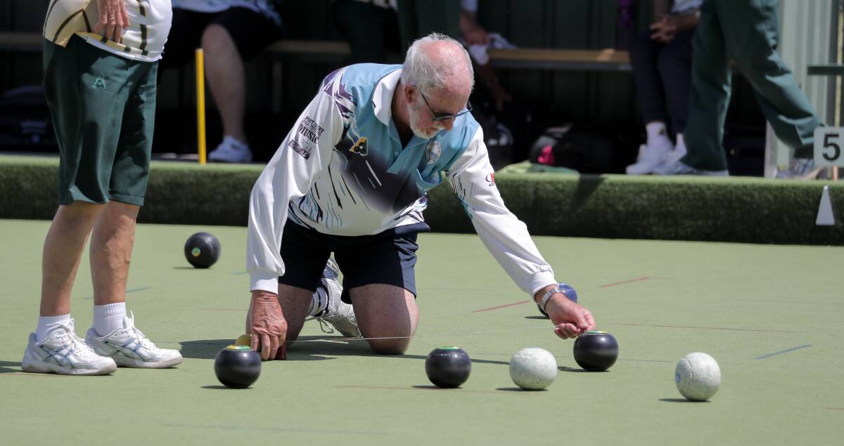 WAITING GAME: Port Fairy's John McIntyre takes a measure at the head in its division three clash at Lawn Tennis. Picture: Rob Gunstone
