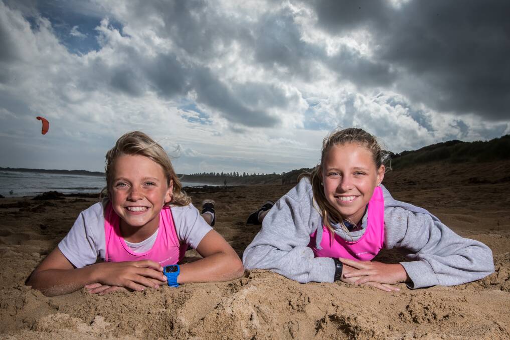 BEACH BUDDIES: Little nippers Moses Stromvall-O'Brien and Charli Groves are excited to be a part of Warrnambool Surf Lifesaving Club's 50-strong squad training group. Picture: Christine Ansorge