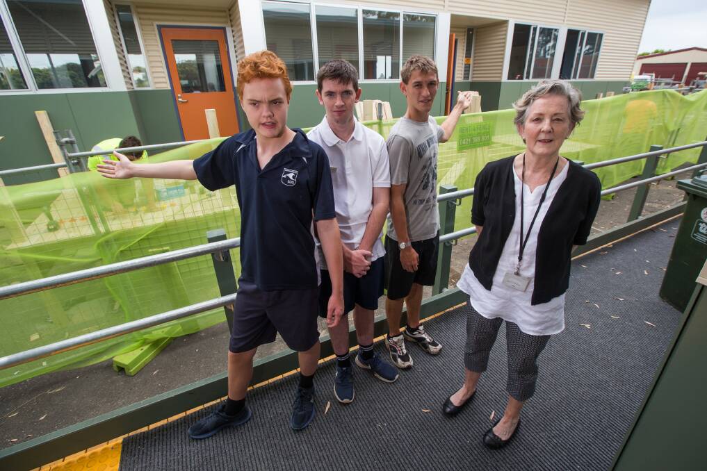Patrick Wilks, Harry Creece, Brad Warnecke and Sue Fraser pictured in front of the under-construction campus in 2017. Picture: Morgan Hancock