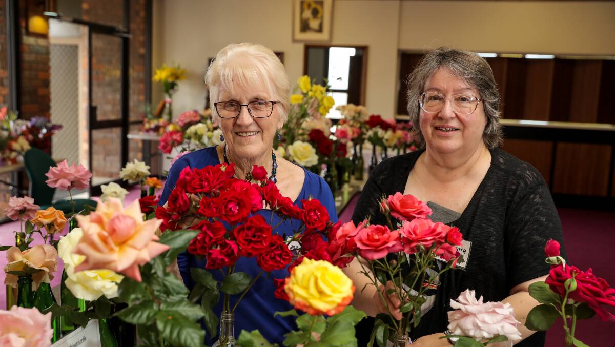 Colourful: Helen Murphy and Sue Smith with some of the flowers at last year's show. This year there is a floral art demonstration on Saturday at 1.30pm. Picture: Rob Gunstone