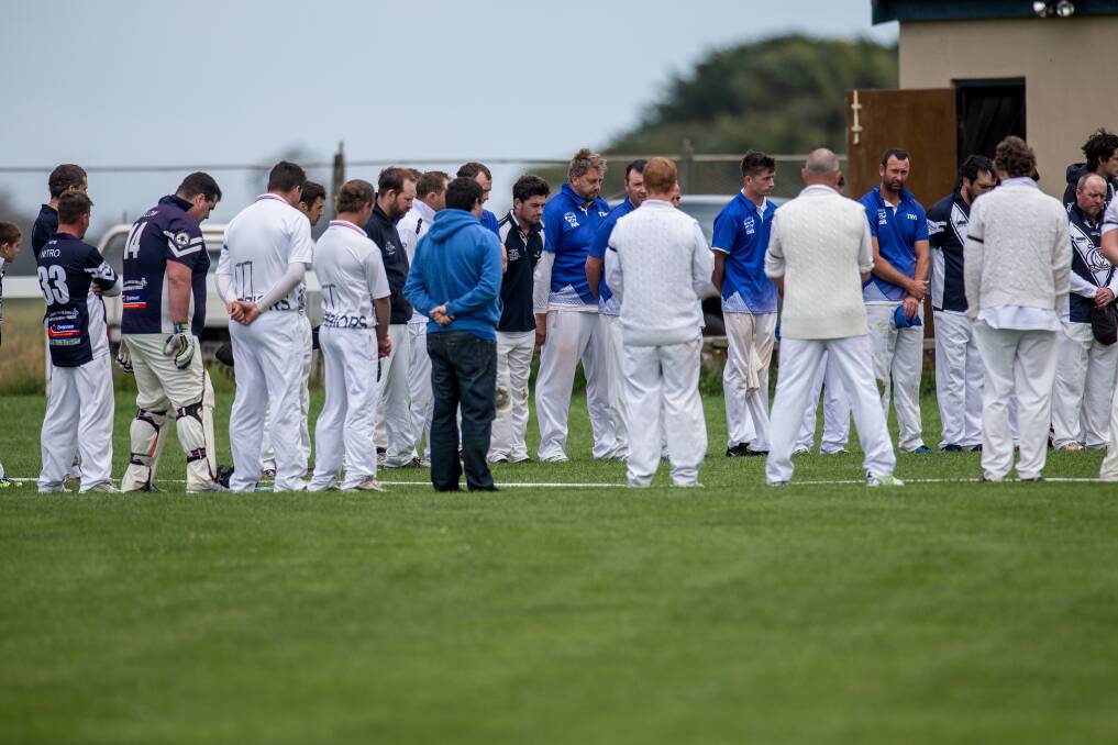 FAREWELL: Grassmere Cricket Association players take a minute's silence in honour of  John 'Jakes' McDonald who passed away on Wednesday. Picture: Christine Ansorge
