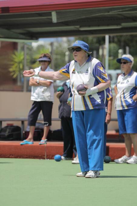 THAT WAY: Warrnambool skip Helen Lock checks the direction for her bowl.