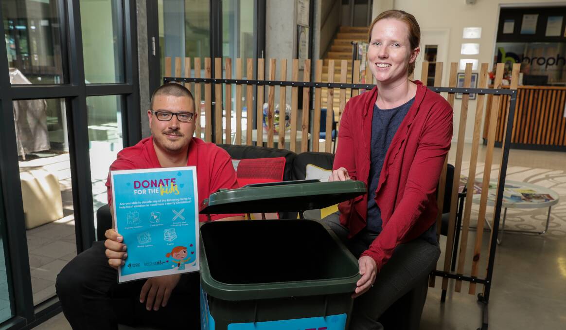 Generous: Brophy school and community program manager Rahman Gray and Warrnambool City Council youth development planner Katie McKean are looking for more items to fill the Beyond the Bell Donate for the Kids appeal bin. Picture: Rob Gunstone
