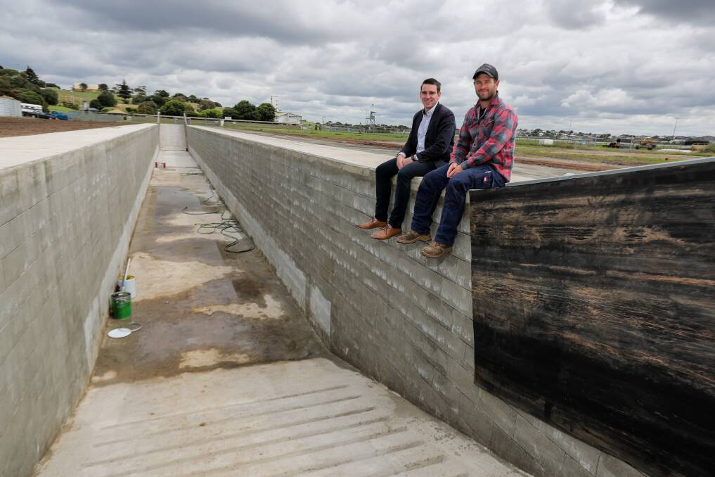 ASSET: Warrnambool Racing Club chief executive officer Peter Downs and racecourse manager Daniel Lumsden in the new horse training swimming pool. Picture: Rob Gunstone