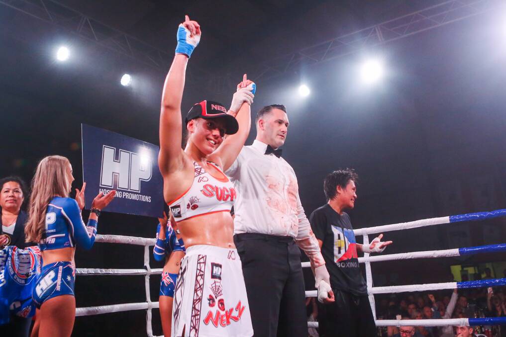 Sweet victory: 'Sugar' Neekz Johnson holds a perfect 10-0 record after her win on Friday night and is now determined to fight for a world title. Picture: Morgan Hancock
