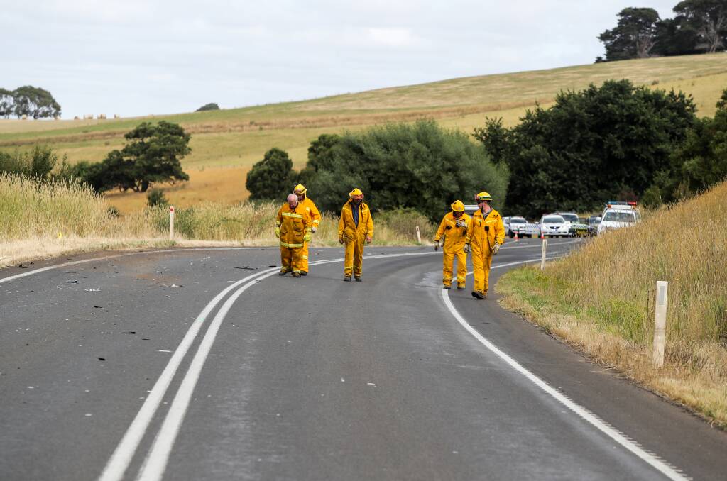 Police, CFA and SES members secure the scene of a fatal car accident on the Cobden-Stonyford Road. Picture: Rob Gunstone