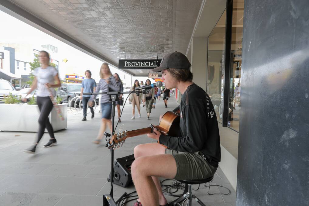 Warrnambool's Flynn Gurry, 17, entertained the shoppers who made their way along Liebig Street. Picture: Rob Gunstone