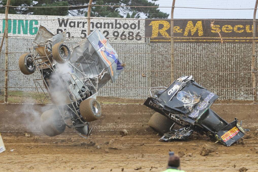 CRUNCH: Rusty Hickman (grey car) and Tim Kaeding (black car) crash in spectacular fashion during a night one heat at the 2018 Grand Annual Sprintcar Classic. Picture: Morgan Hancock 