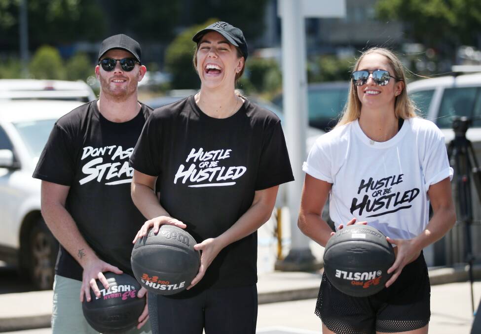 LAUNCH: Former AFL player Adam Cooney, Australian Opal Jenna O'Hea and Melbourne Boomers' Rebecca Cole at a joint NBL and Basketball Australia announcement in Melbourne in January, 2018, which unveiled 3x3Hustle. Picture: AAP Image/David Crosling