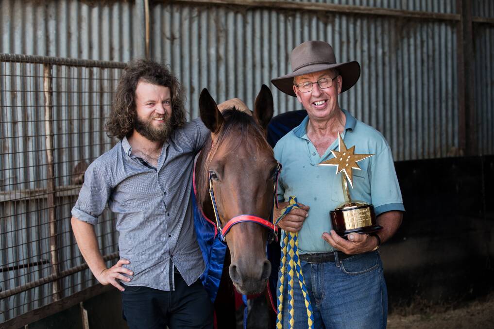 HAPPY TIMES: Cudgee trainer John Meade (right) with his son Patrick and his star horse Sparkling Success on their south-west property on Sunday. Picture: Christine Ansorge