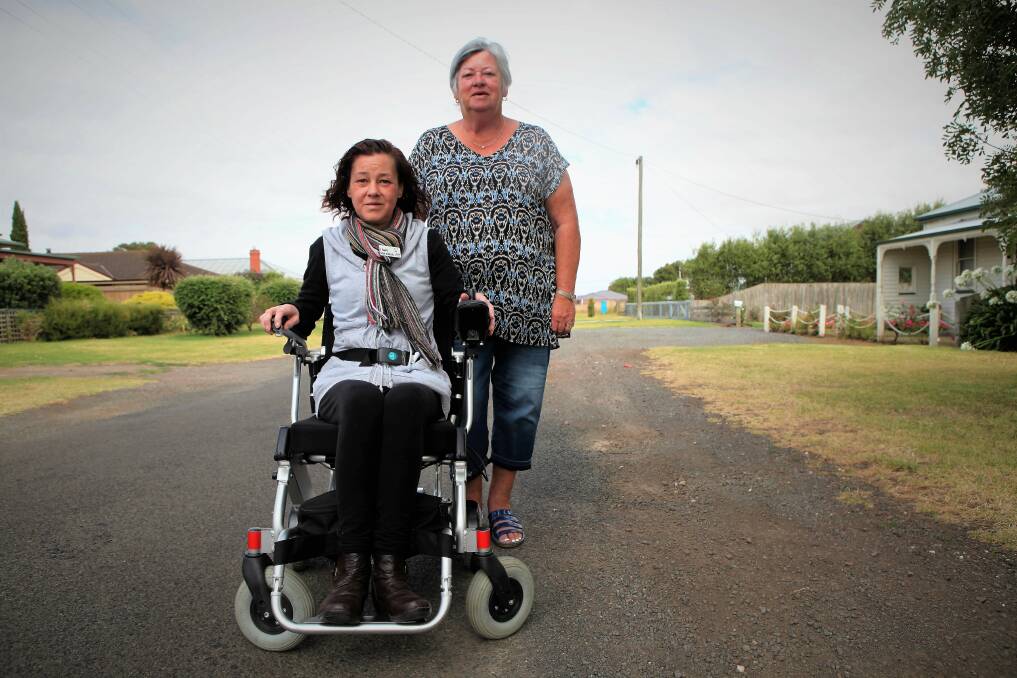 Upgrade call: Koroit's Vicky Walter and Marlene Lenehan want a footpath in Black Street to make getting around safer. Picture: Anthony Brady