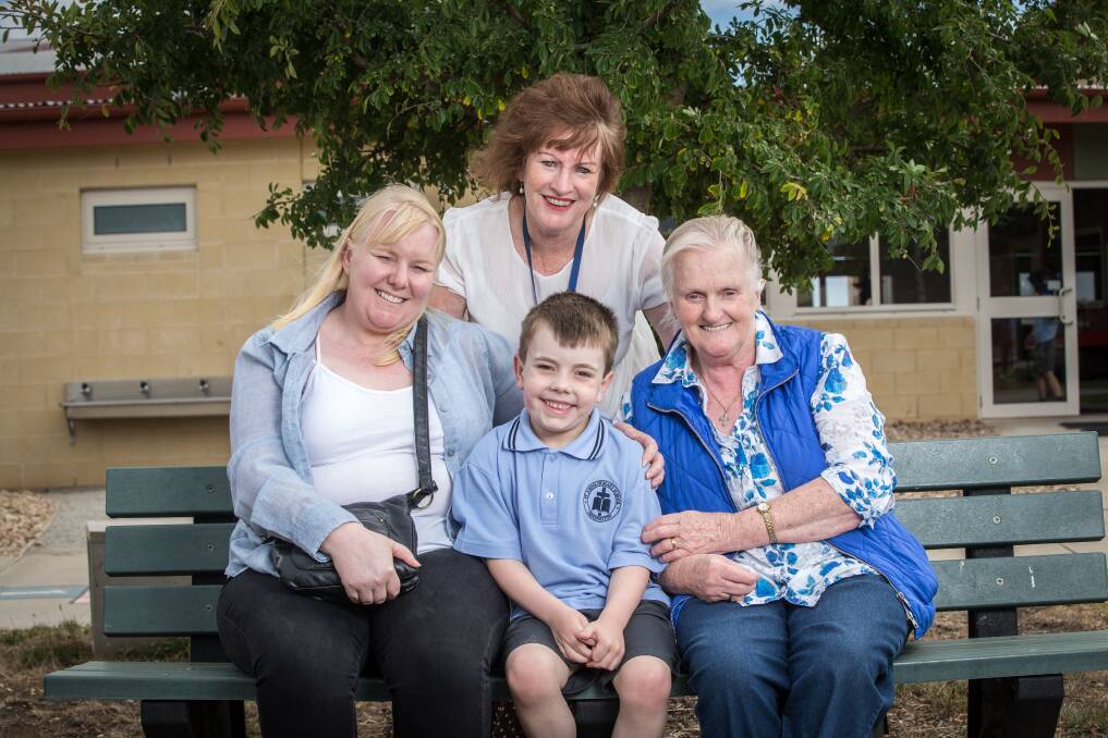 Proud principal: Jo Sachse, Riley Sachse, 5, Julie Hoare and principal Kathy Dalton are marking four generations at Dennington's St John's Primary School. Picture: Christine Ansorge