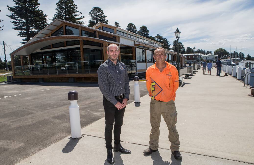 New look: Fairbrother Construction project manager Aaron Finnigan and foreman Tony Sharam outside the wharf building. Picture: Christine Ansorge