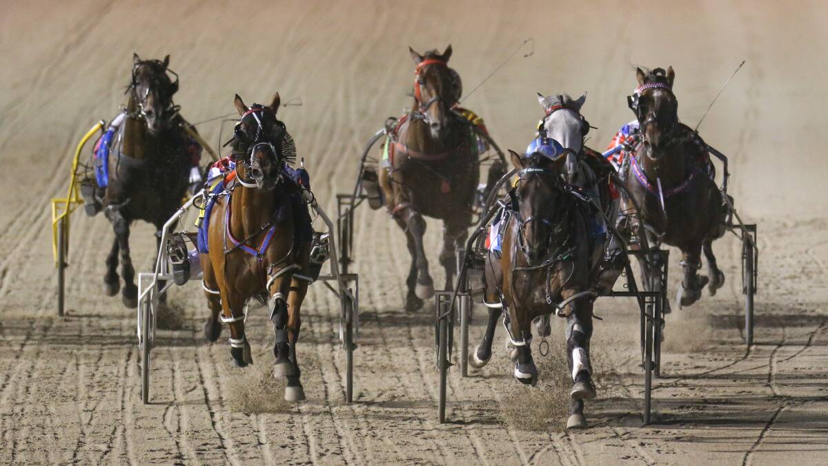 Charging along: Horses compete for the Terang Pacing Cup. Terang Harness Racing Club will hold its metropolitan class meet on Saturday. Picture: Morgan Hancock 