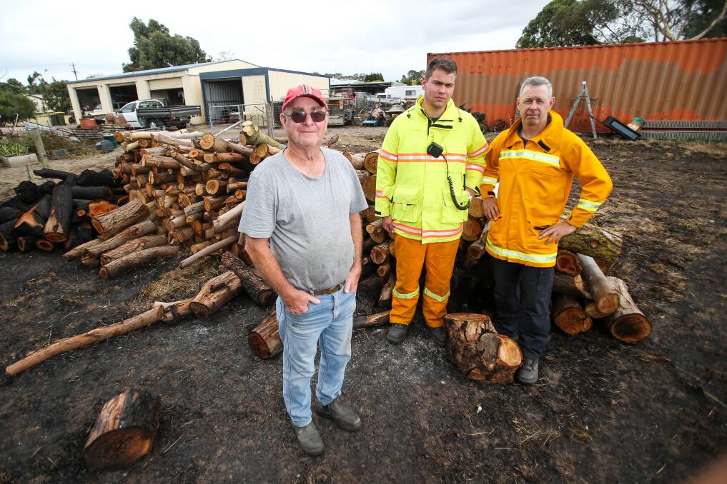 RELIEF: Alan Buckland, Michael Williams and Paul Gleeson at Terang. Mr Buckland saved his son-in-law Stewart Benallack's house. Picture: Morgan Hancock
