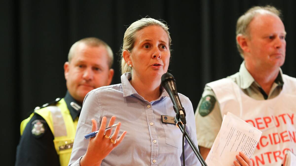 Support: Corangamite mayor Jo Beard addresses Monday's packed Terang community meeting on the south-west fires. Picture: Morgan Hancock