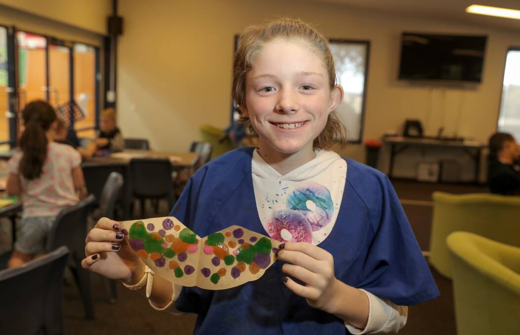 SPREADING WINGS: Reegan Searle, 10, with her painted butterfly. Picture: Rob Gunstone