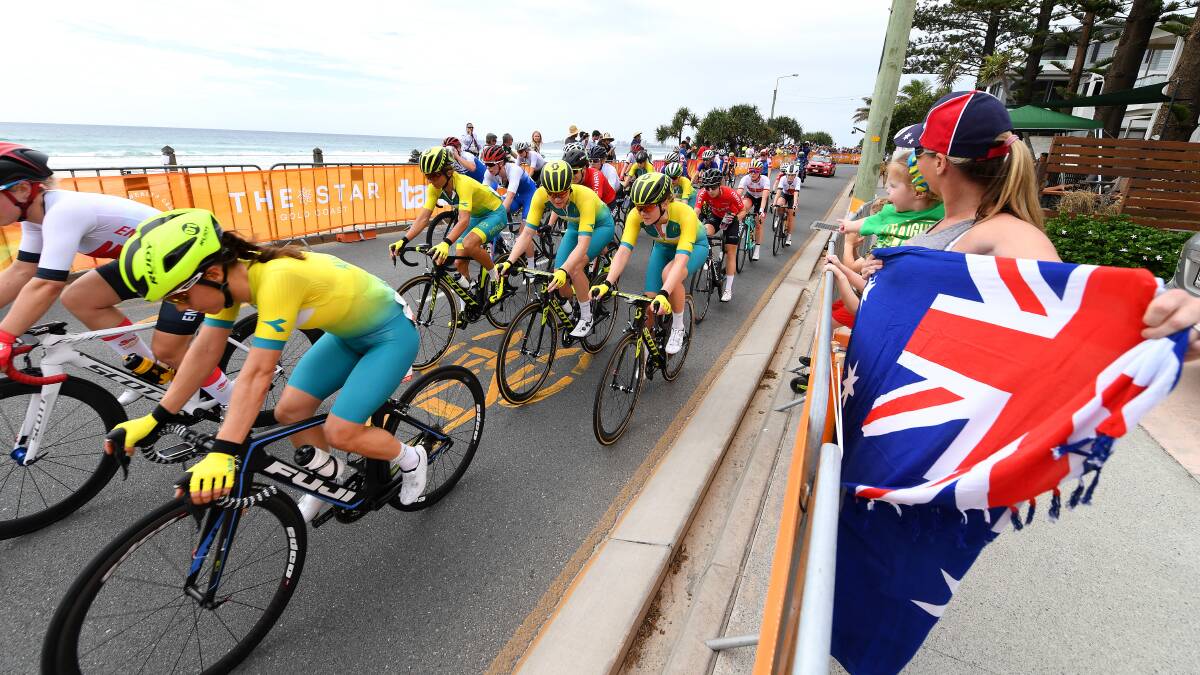 OFF AND RACING: Portland export Shannon Malseed leads the Australian team out at the start of the women's road race at the Commonwealth games on the Gold Coast. Picture: AAP Image/Dan Peled
