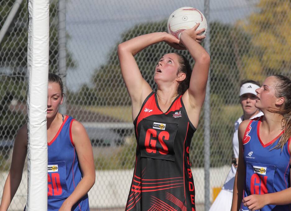 BOMBS AWAY: Cobden's off-season recruit Emily Finch has been a standout in the shooting circle for the re-energised Bombers. Picture: Rob Gunstone